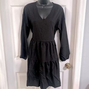 Ultranice black women’s ruffles V neck dress, size large. NWT.